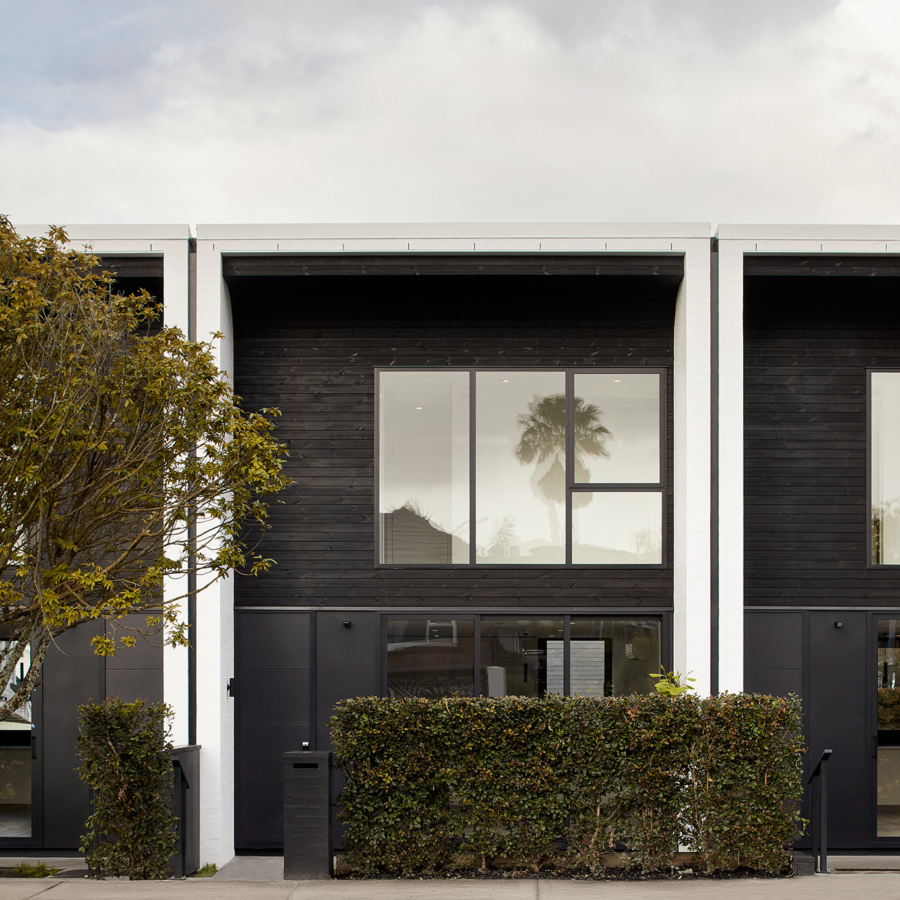 TMT Taiga vertical shiplap cladding coated in JSC Scumble Nightfall on Huia Road Project